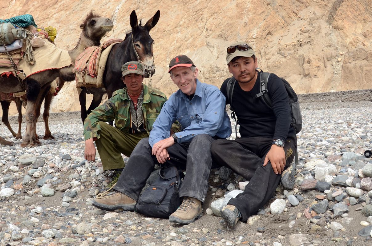 05 Camel Man, Jerome Ryan, Guide Muhammad Resting In Wide Shaksgam Valley After Leaving Kerqin Camp On Trek To K2 North Face In China